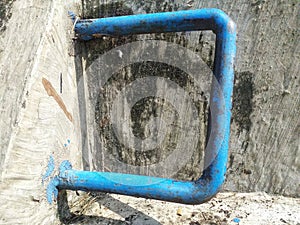 Iron hadrail on one of the steps of the white river retaining wall