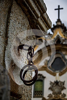 Iron handcuffs used to torture slaves in front of a church