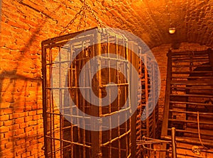 Iron hanging medieval torture cages. Medieval torture. Inquisition torture chamber. Old medieval torture chamber with