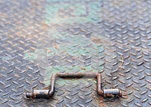 Iron hatch and handle in close up