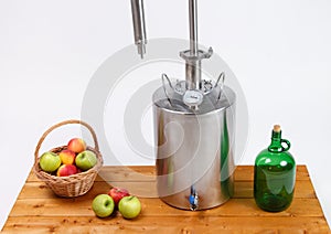 Iron hooch with apples on white background