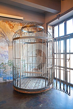 Iron huge round human cage with a swing inside. bdsm furniture made of steel photo