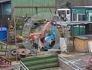 iron junk yard scrap heap with colorful old rusty metal tools