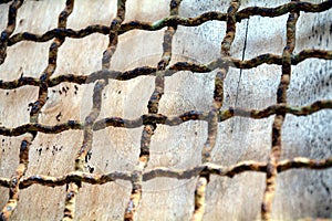 Iron net decaying wall abstract background, craps and holes, abstract background