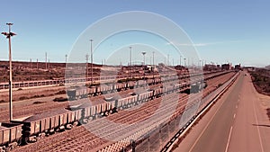 Iron ore filed railway wagons arriving at Saldanha Bay South Africa