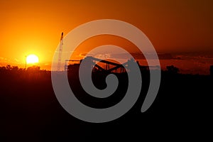 Iron Ore processing plant at sunset