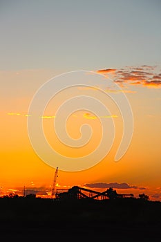 Iron Ore processing plant at sunset