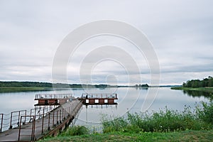 Iron pier on Lake Dryvyaty on a summer day. Braslav lakes. Belarus
