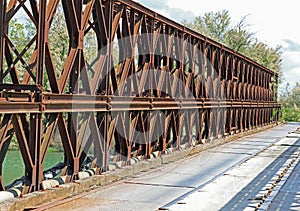 iron railing on a high bridge preventing falls into the river