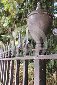 Iron railings bordering a London garden square in Autumn photo