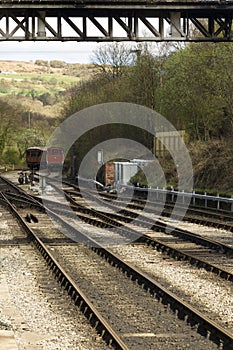 Iron railway tracks converging on the North Yorkshire Moors Rail