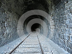 Iron road bridges metal rail light at the end of the tunnel train transport photo
