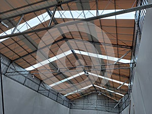 iron roof truss construction in a factory