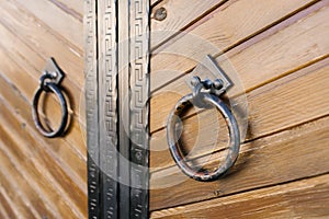 Iron round door handles on wooden doors