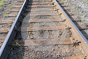 Iron Rusty Train Railway Detail Over Dark Stones