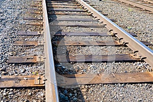 Iron Rusty Train Railway Detail Over Dark Stones