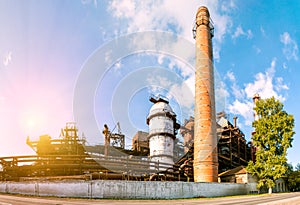 Iron smelter factory in the rays of the evening sun