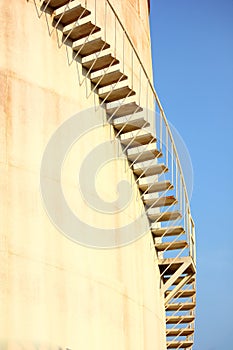 The iron stairs on oil stock tank