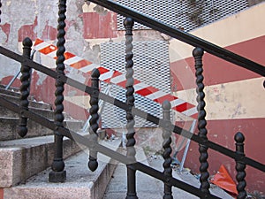 Iron stairs with demarcation fence photo
