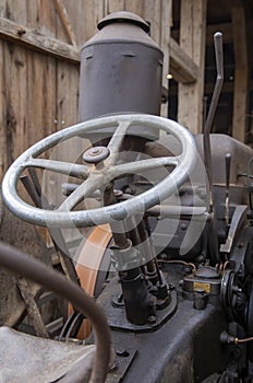 Iron steering wheel of a vintage tractor