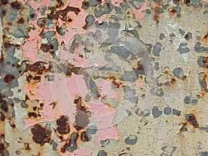 Iron texture with aged paint of different colors and rust photo