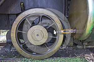 Iron wheels of stream engine locomotive train on railways track