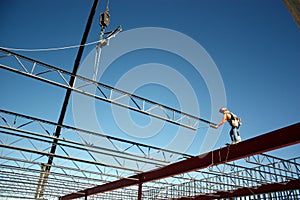 Iron Worker Placing Bar Joist