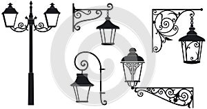 Iron wrought lanterns with decorative ornaments