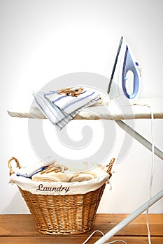 Ironing board with laundry