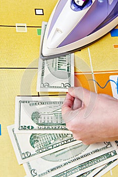 Ironing dollars banknote