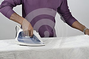 Ironing a tablecloth