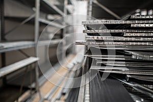 Irons stacked in a warehouse during assembly