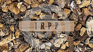 IRPF was written on the wooden surface. Wooden Concept photo