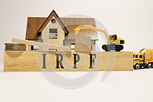 IRPF was written on the wooden surface. Wooden Concept photo