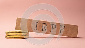 IRPF was written on the wooden surface. Wooden Concept photo