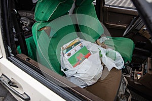 Irpin, Kyev region Ukraine - 09.04.2022: Children`s books and things in the car.