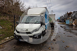 Irpin, Kyev region Ukraine - 09.04.2022: Cities of Ukraine after the Russian occupation. On the streets of Irpin. Shot cars. Irpin