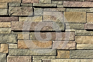 Irregular Brick Wall with Differently Colored Stones