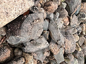 irregular pile of stones and closeup pebbels