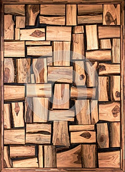 Irregularly shaped brown wooden blocks background