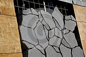 Irregularly shaped cracked paving block made of concrete. cracked dry soil pattern can be used as drainage paving or in combinatio