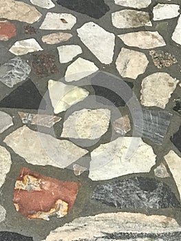 irregularly shaped stones of a wall covering