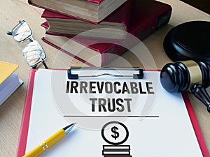 Irrevocable trust document is shown using the text photo