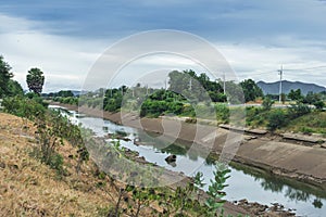 Irrigation canal or irrigation channel in concrete wall Send water from the reservoir to the agricultural area of â€‹â€‹the farmer