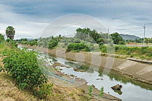 Irrigation canal or irrigation channel in concrete wall Send water from the reservoir to the agricultural area of â€‹â€‹the farmer