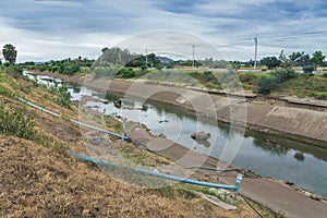 Irrigation canal or irrigation channel in concrete wall Send water from the reservoir to the agricultural area of â€‹â€‹the farmer