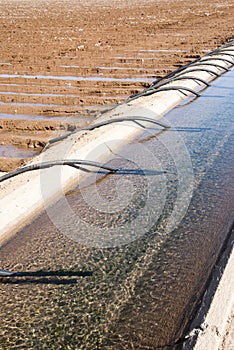 Irrigation canal & siphon tubes photo