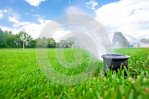 irrigation with the help of pressure jets with water at the football stadium