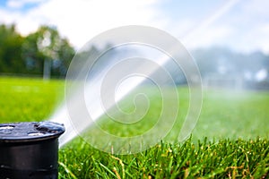 irrigation with the help of pressure jets with water at the football stadium