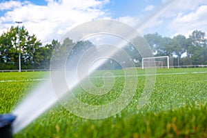 irrigation with the help of pressure jets with water at the football stadium